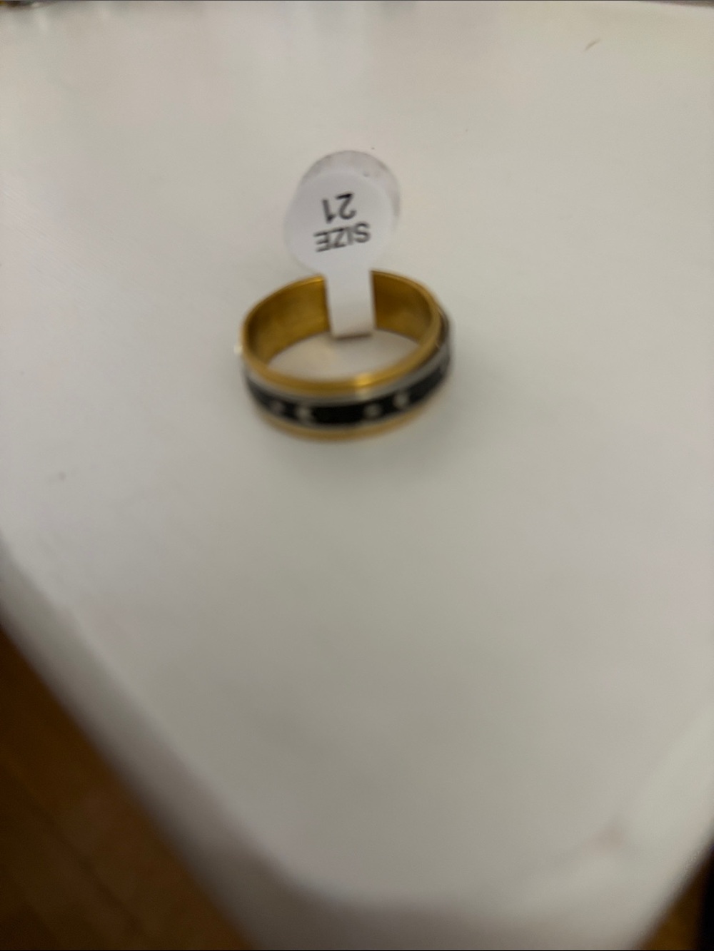 Men gold and black ring